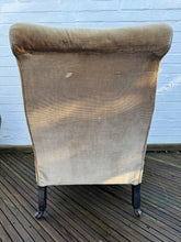 A late 19th century slipper chair