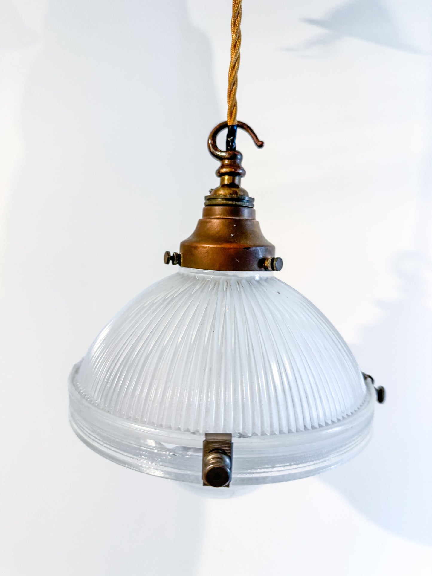 A Pair Of Holophane Pendant Lights