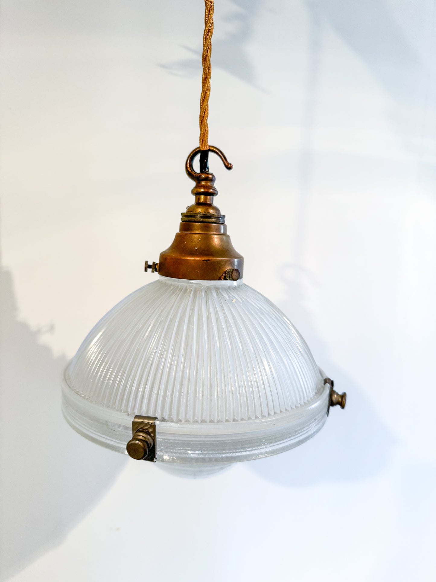 A Pair Of Holophane Pendant Lights