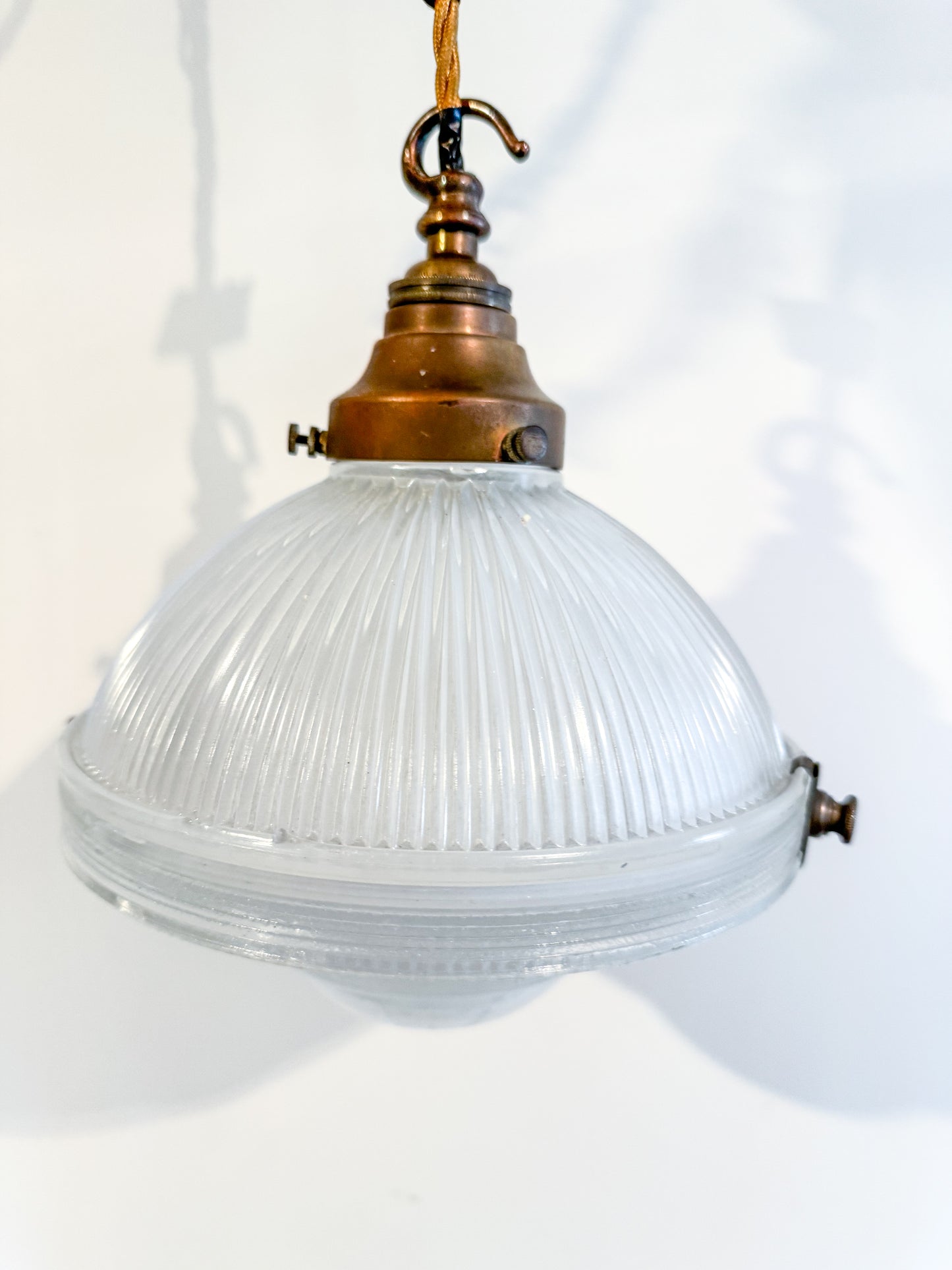 A Pair Of Holophane Pendant Lights