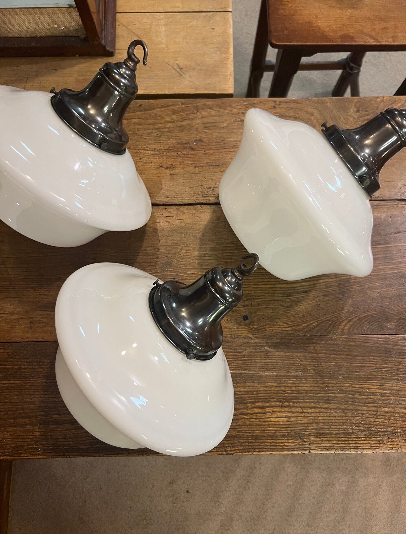 A run of four opaline pendant lights