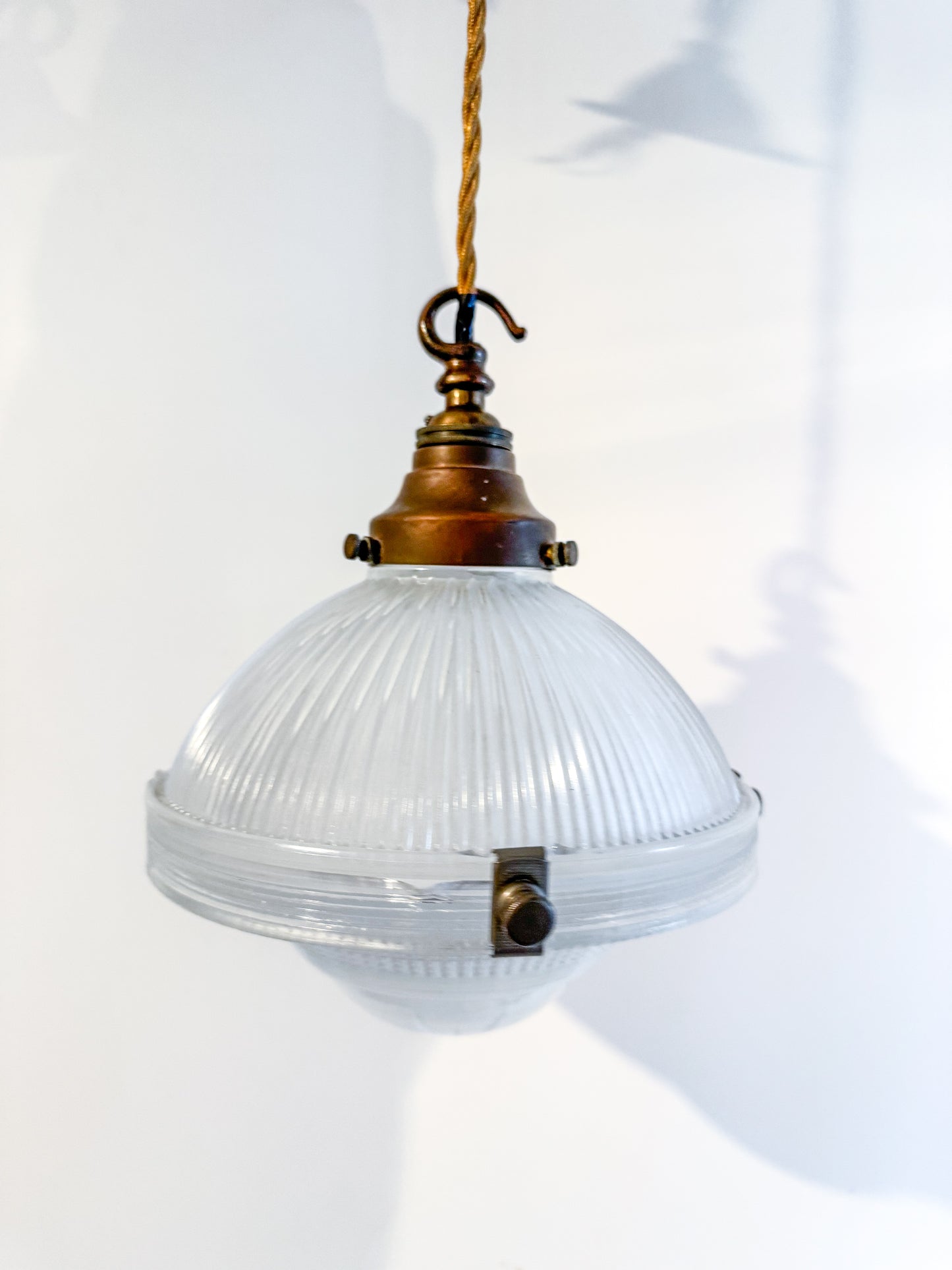 A Pair Of Holophane Pendant Lights