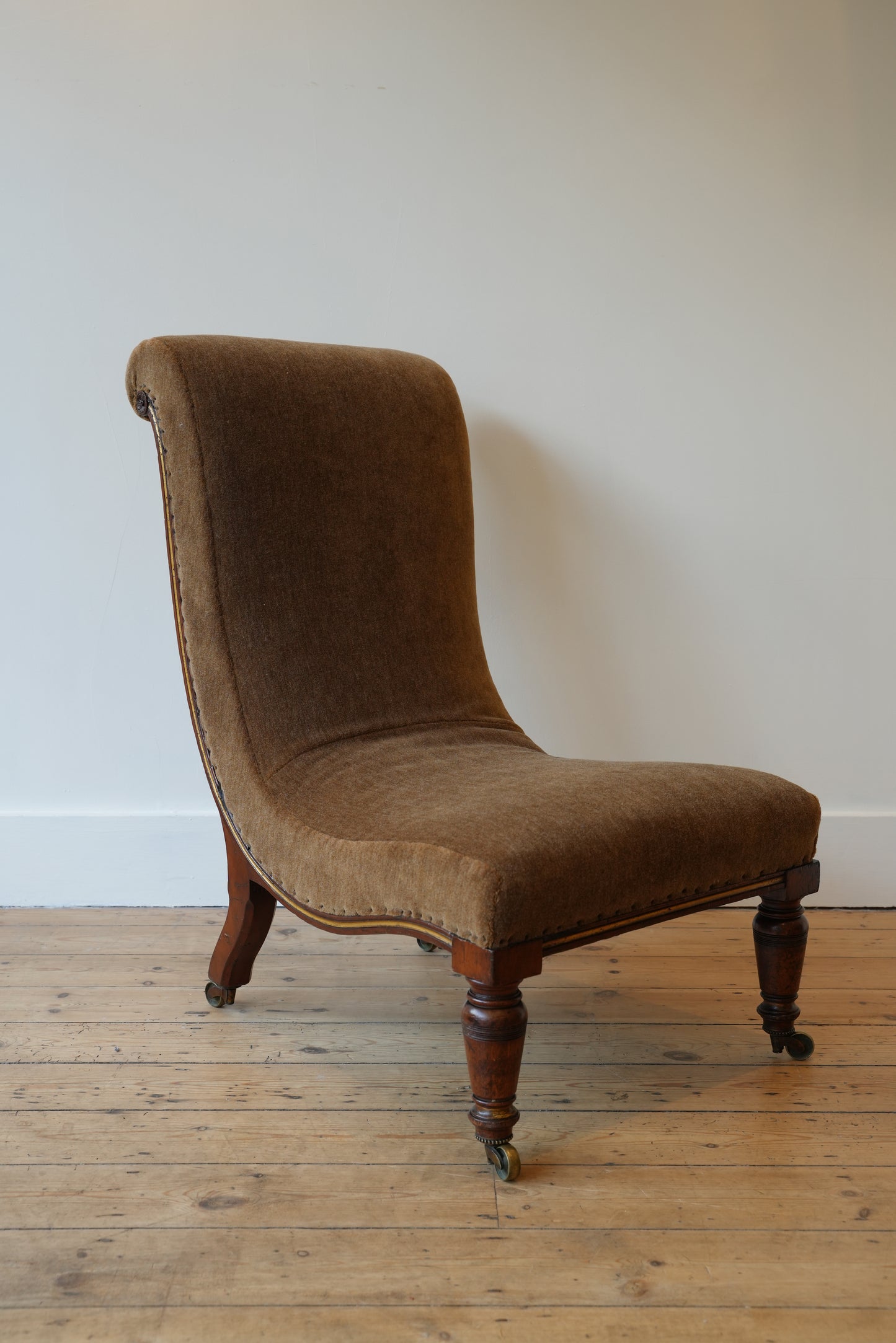 Slipper chair by Gillows.