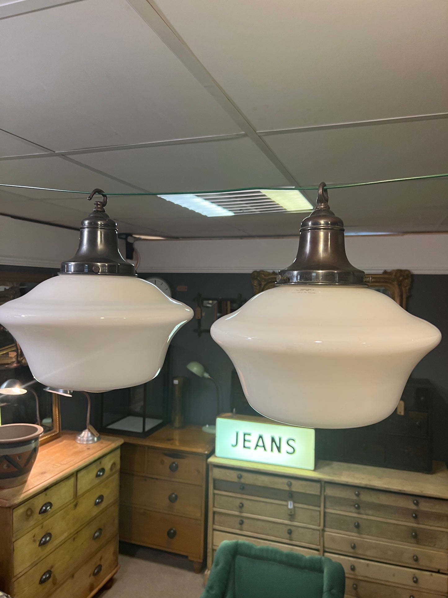 A run of four opaline pendant lights