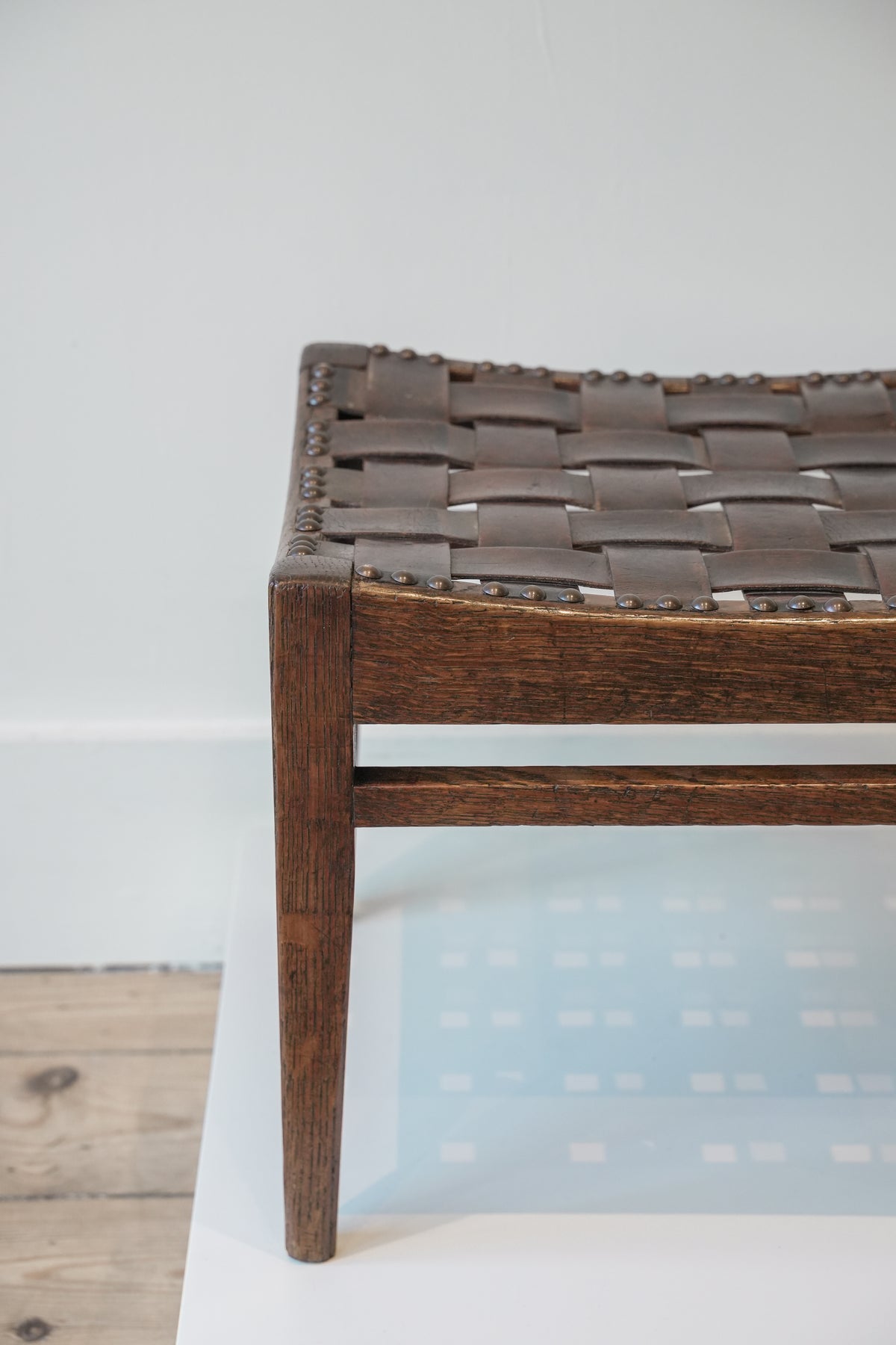 Arthur Simpson, The Handicrafts, Kendall. Woven Leather Footstool.
