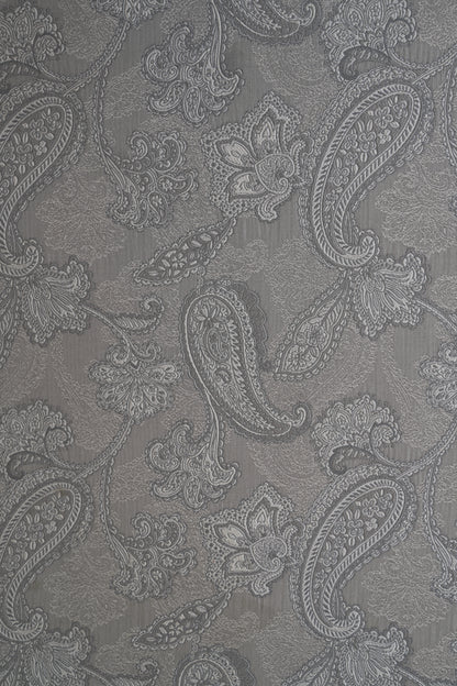 Victorian Paisley covered footstool.