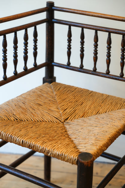 A pair of “Sussex” Corner Chairs.