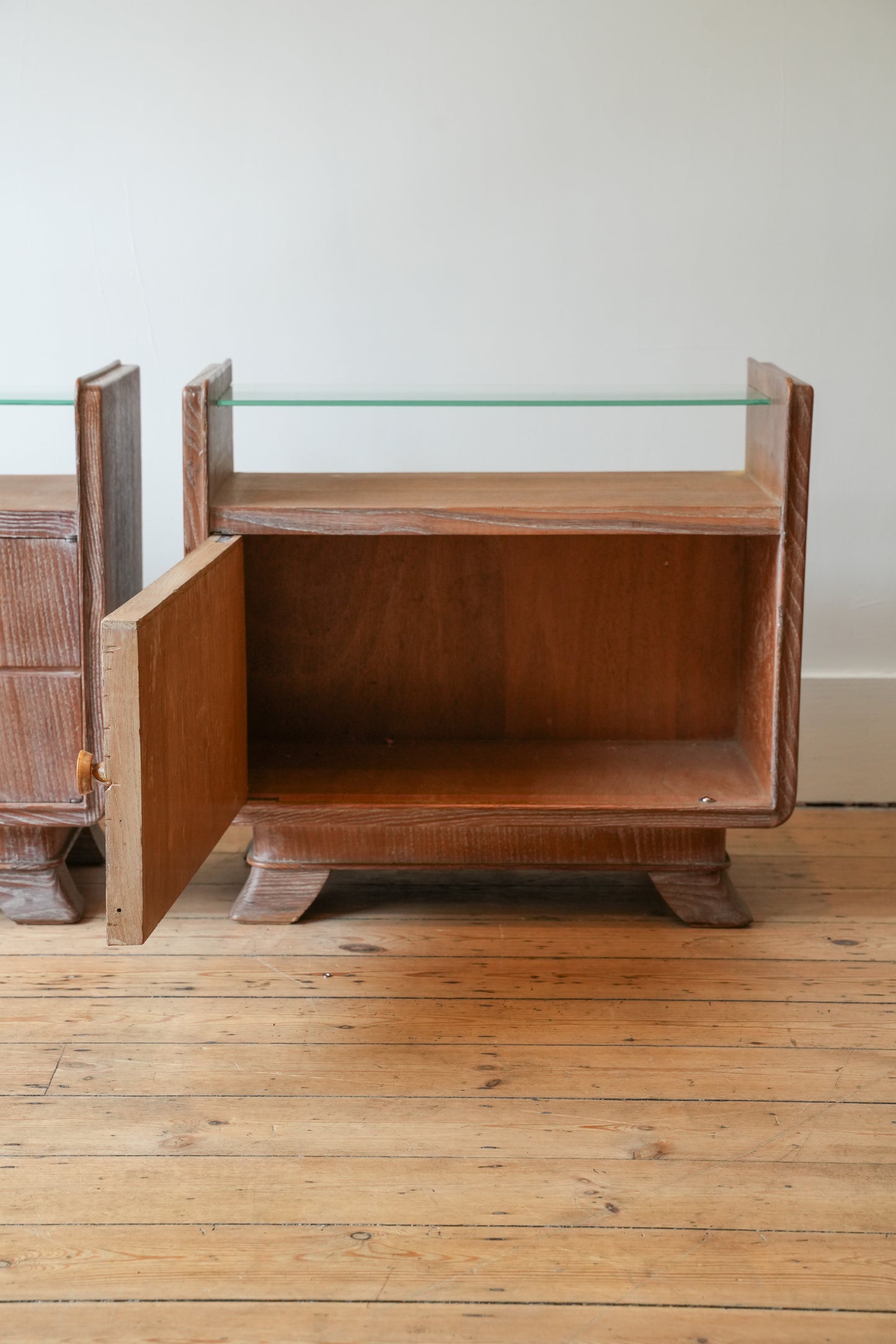 A pair of bedside cupboards by Guglielmo Ulrich.