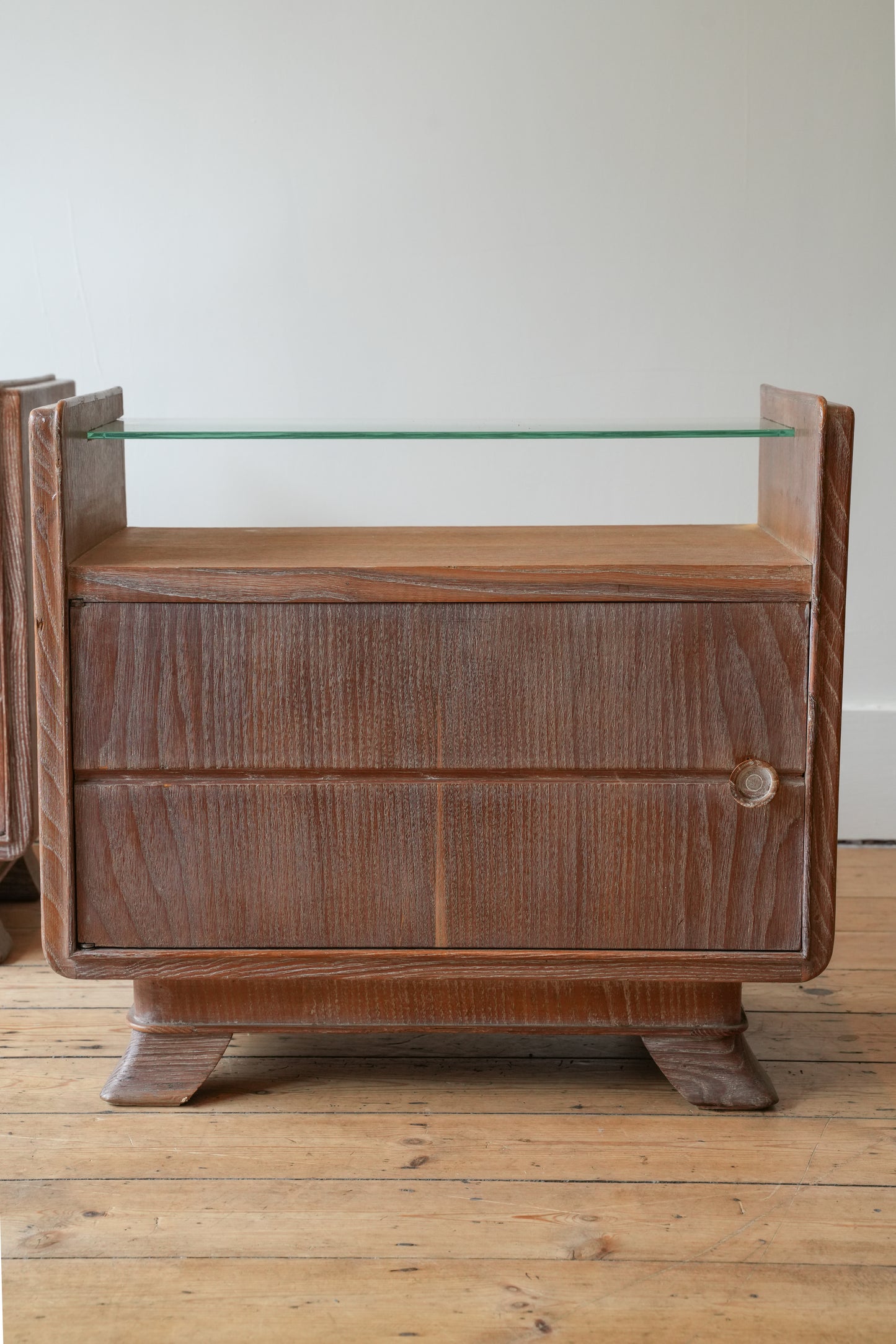 A pair of bedside cupboards by Guglielmo Ulrich.