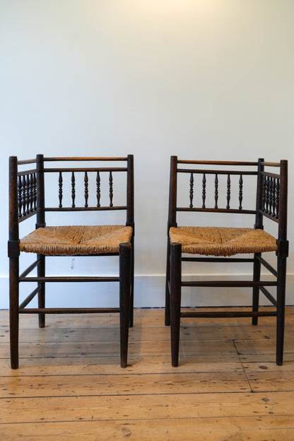 A pair of “Sussex” Corner Chairs.