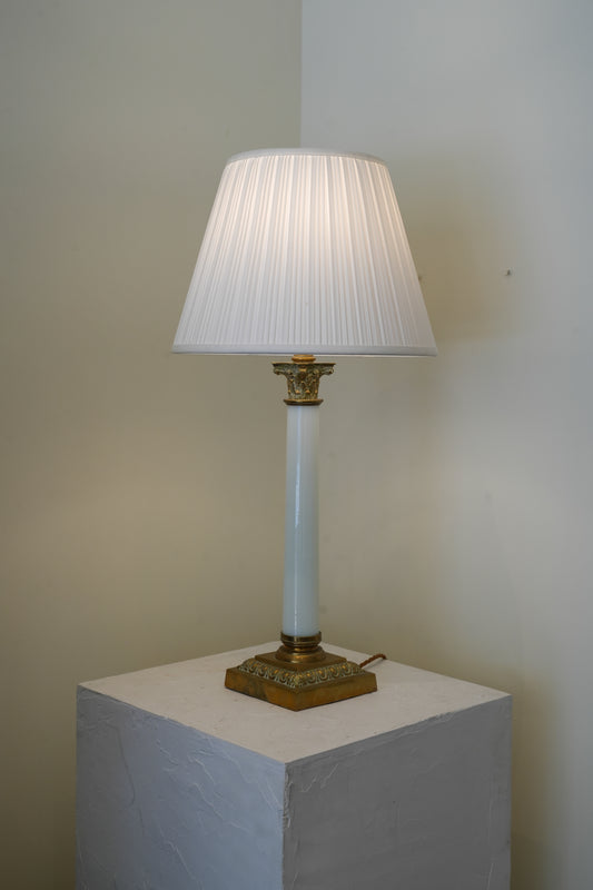A large brass & opaline glass Corinthian column lamp.