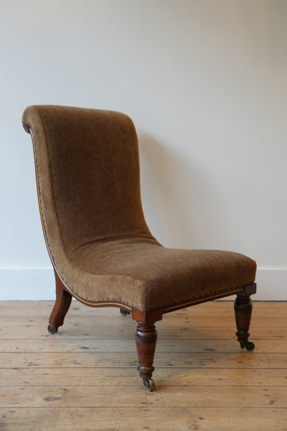 Slipper chair by Gillows.