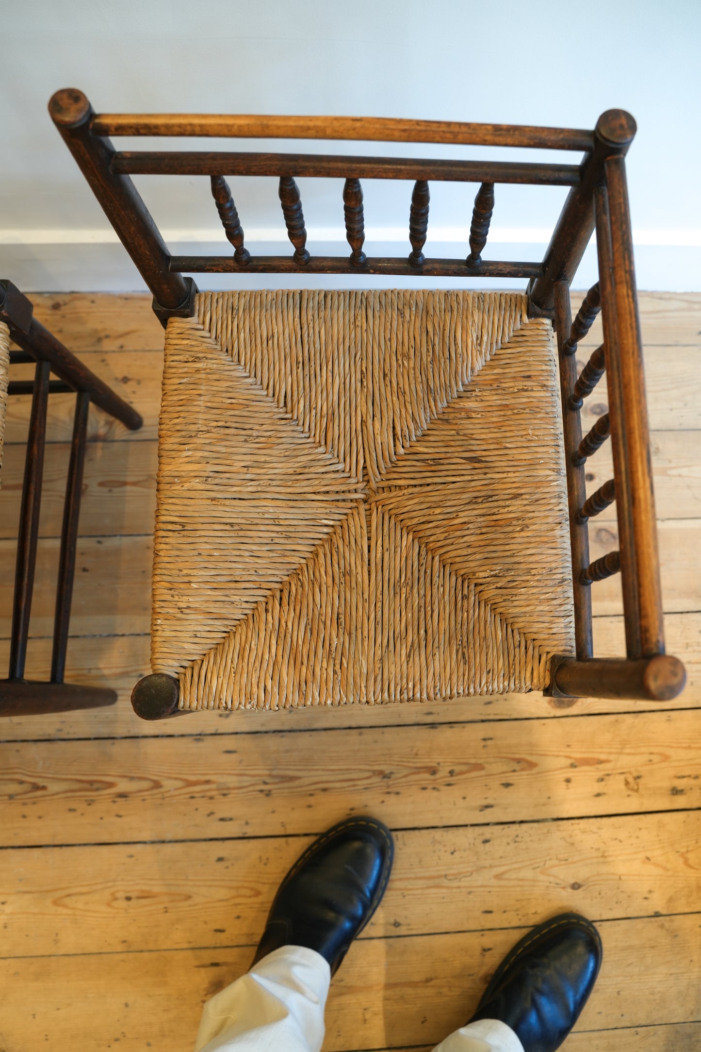 A pair of “Sussex” Corner Chairs.