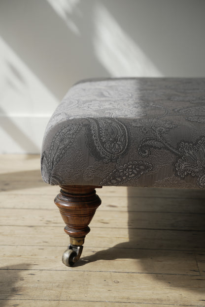 Victorian Paisley covered footstool.