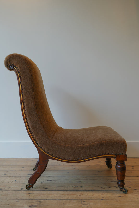 Slipper chair by Gillows.