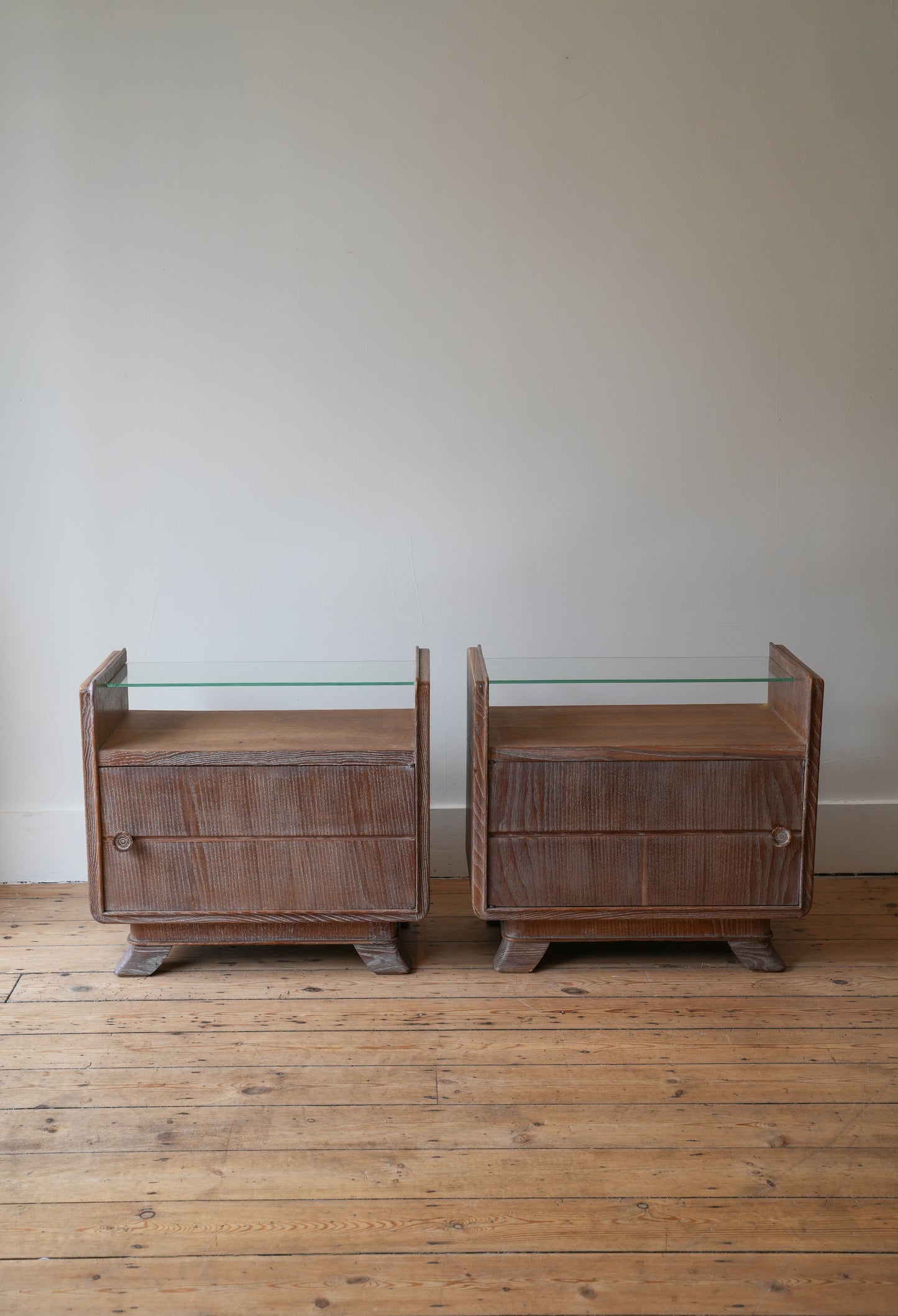A pair of bedside cupboards by Guglielmo Ulrich.
