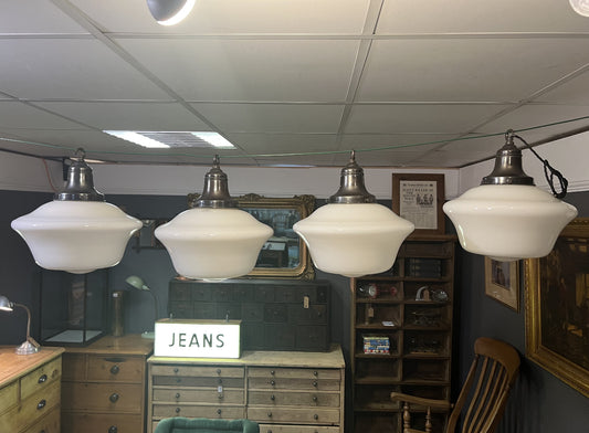 A run of four opaline pendant lights