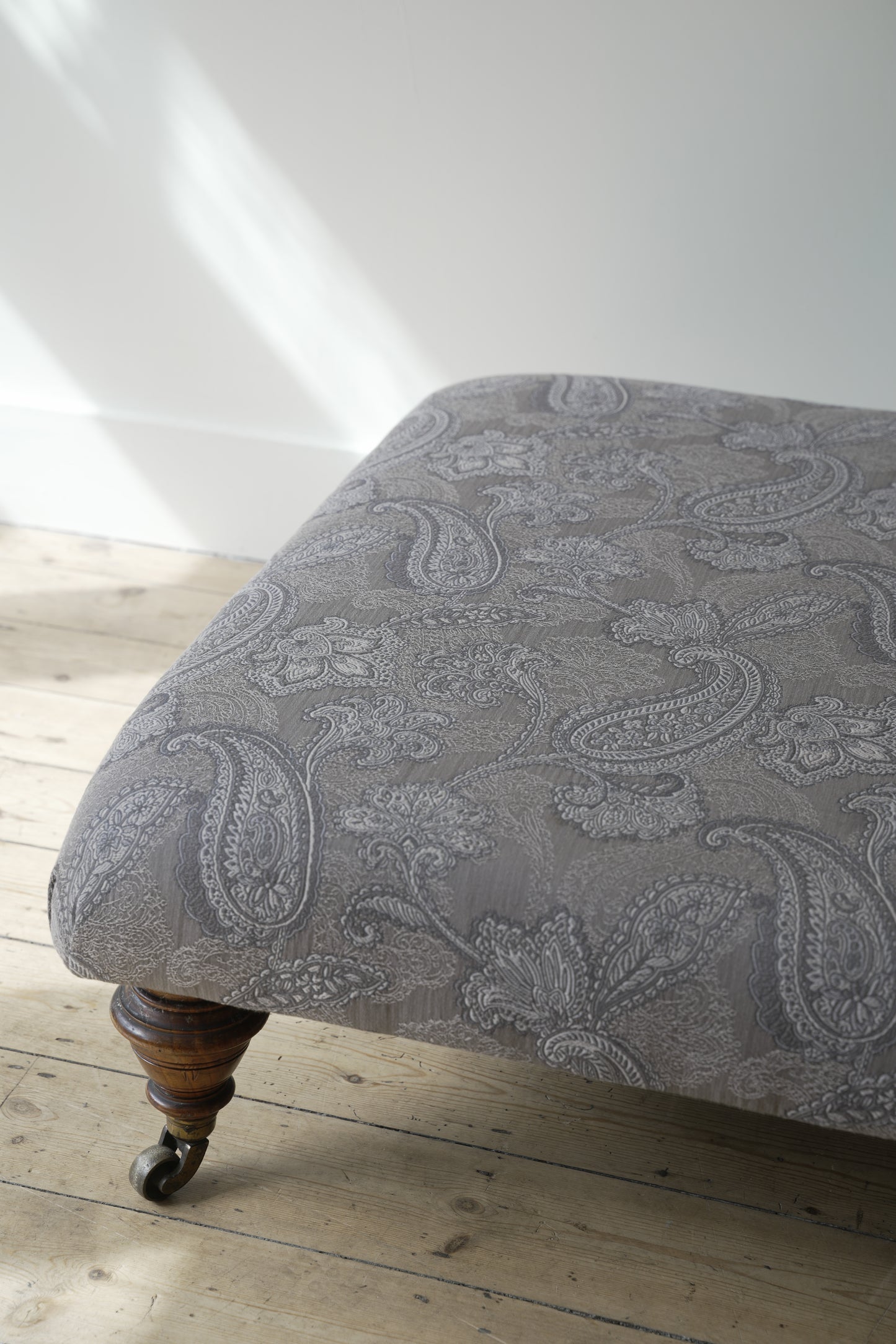 Victorian Paisley covered footstool.