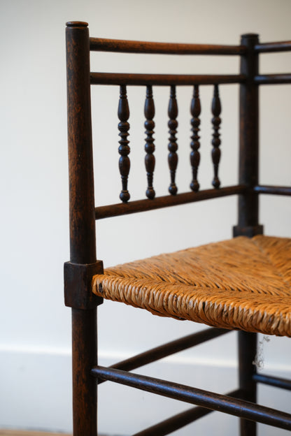 A pair of “Sussex” Corner Chairs.
