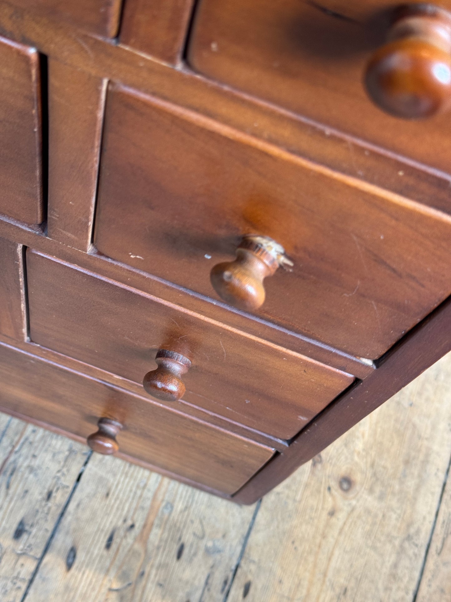 Bank of apothecary style drawers