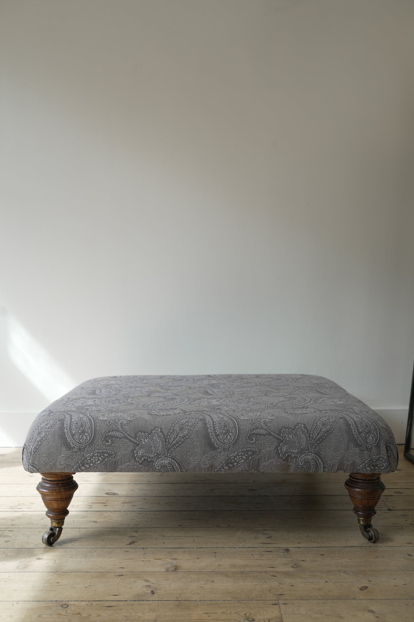 Victorian Paisley covered footstool.