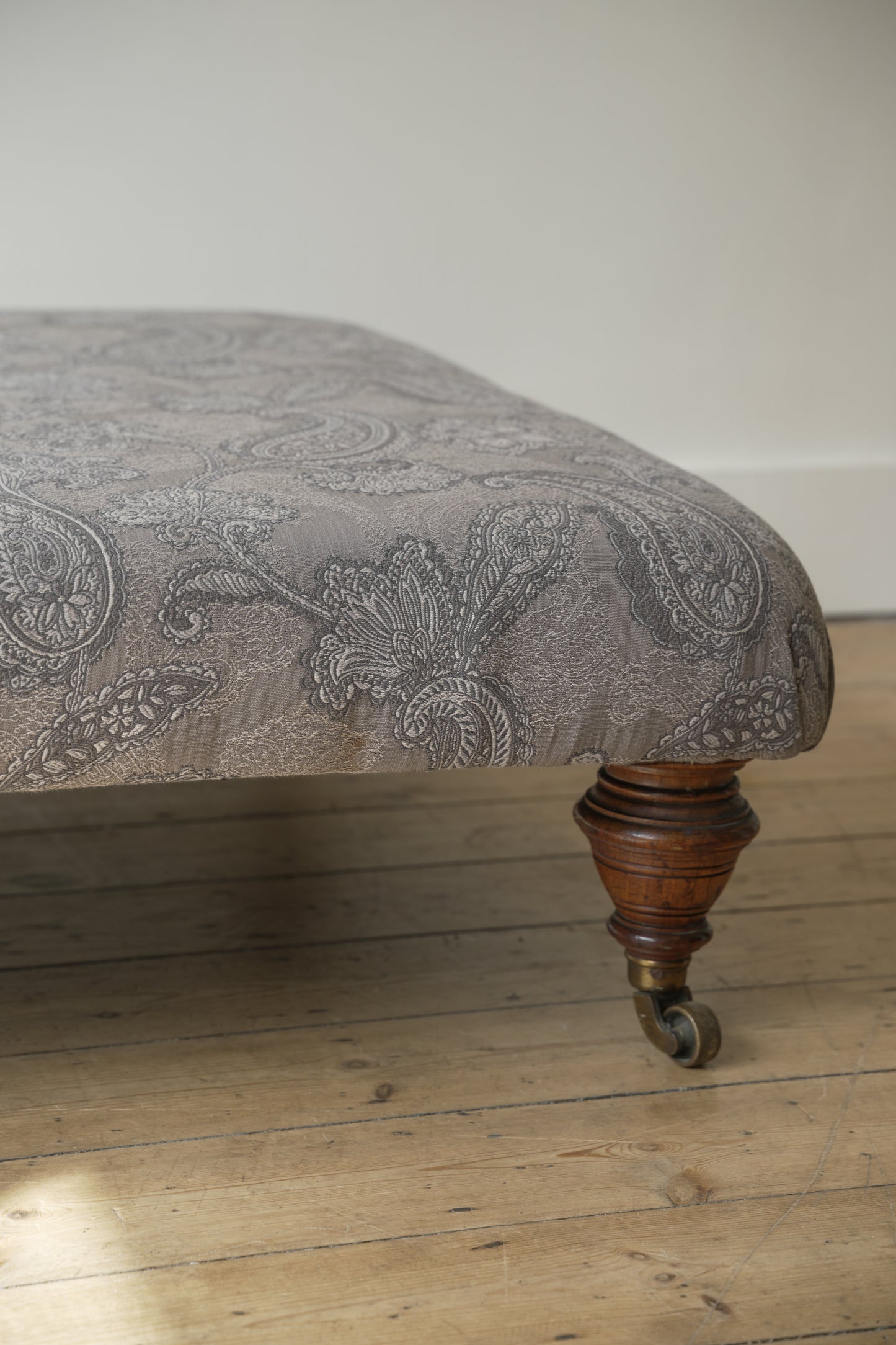 Victorian Paisley covered footstool.