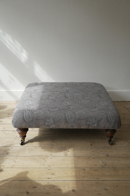 Victorian Paisley covered footstool.