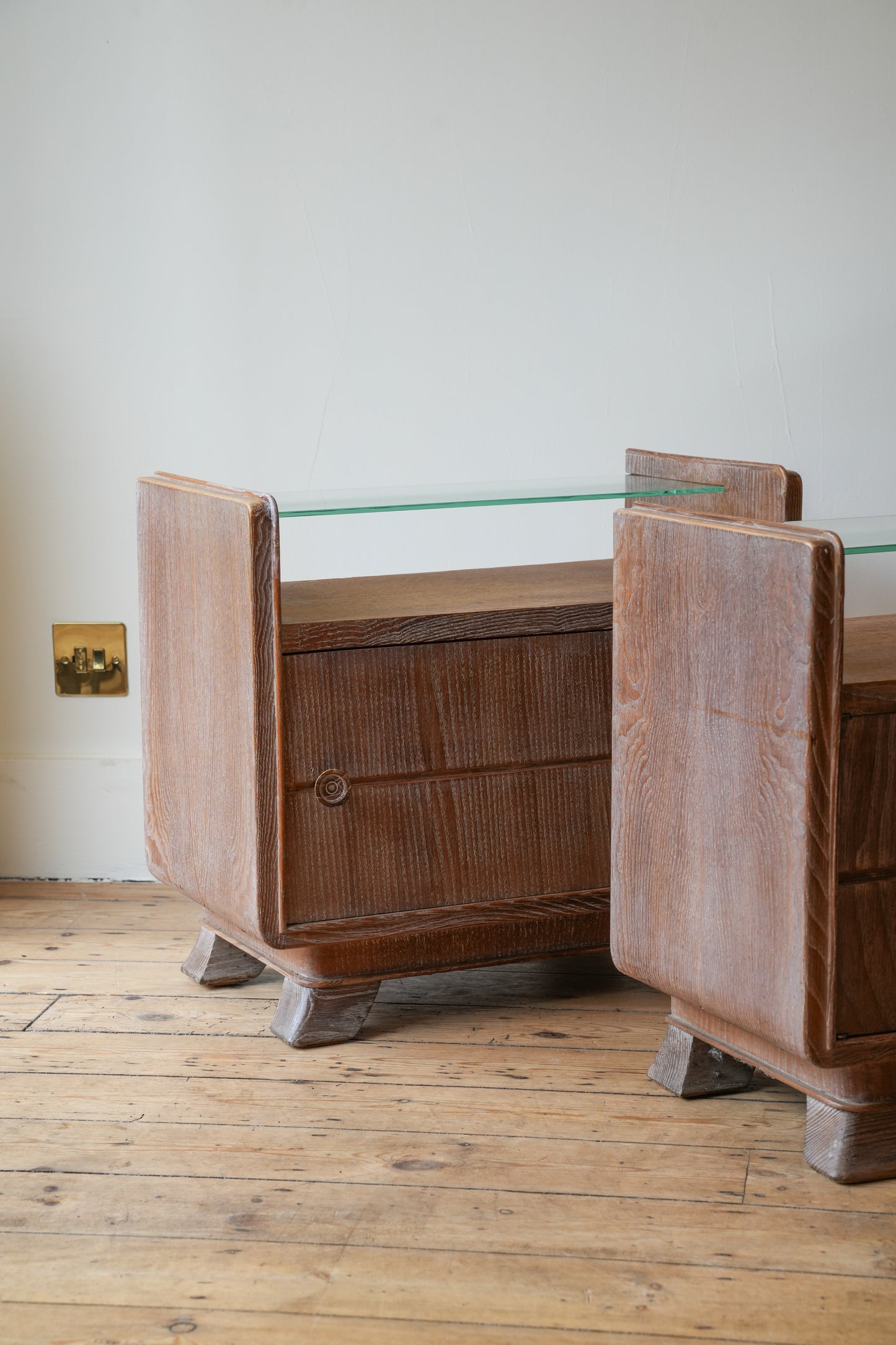 A pair of bedside cupboards by Guglielmo Ulrich.