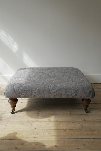 Victorian Paisley covered footstool.
